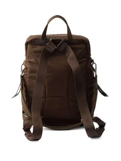 Prada Logo-detail Backpack In Brown