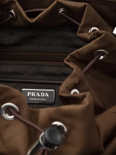 Prada Logo-detail Backpack In Brown