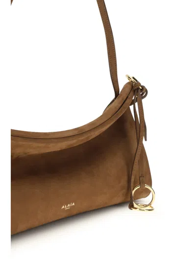 Alaïa Women East West Shoulder Bag In Brown