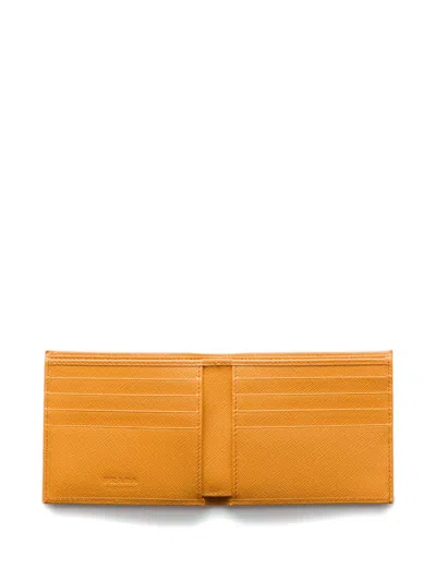 Prada Triangle Logo Leather Wallet In Orange
