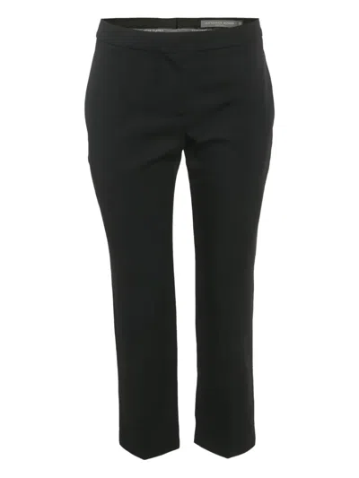Pre-owned Alexander Mcqueen Wool Trousers In Black