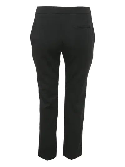 Pre-owned Alexander Mcqueen Wool Trousers In Black