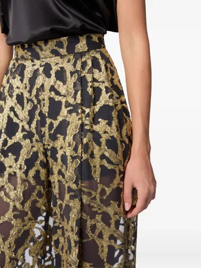 Nina Ricci Printed Plazzo Pants In Gold