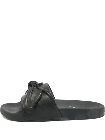 Pre-owned Stuart Weitzman Bow Leather Slides In Black