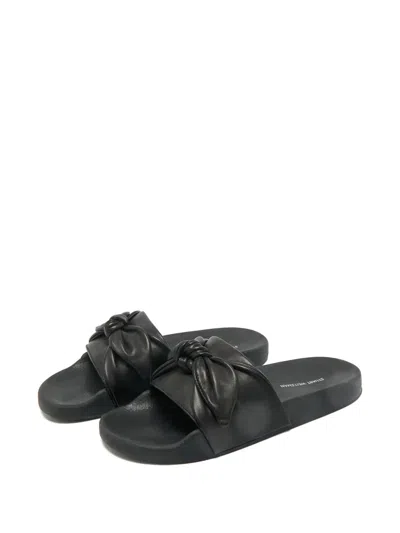 Pre-owned Stuart Weitzman Bow Leather Slides In Black
