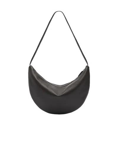 The Row Izzy Small Crescent Shoulder Bag In Leather In Brown