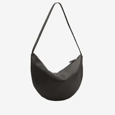 The Row Izzy Small Crescent Shoulder Bag In Leather In Brown
