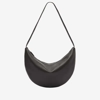 The Row Izzy Small Crescent Shoulder Bag In Leather In Brown
