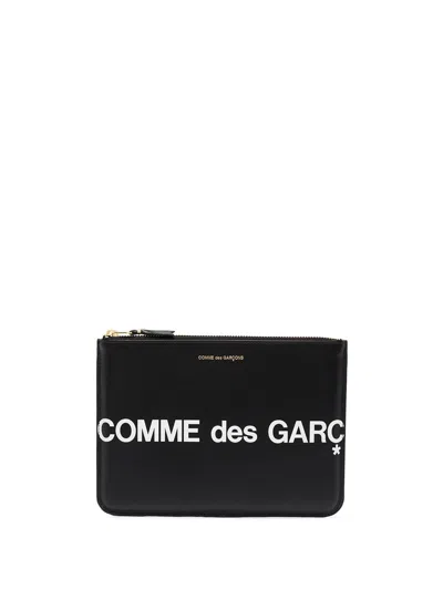 Comme Des Garçons Logo Leather Pouch In Black
