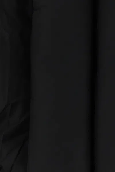 Alaïa Alaia Puffer Jacket With A High Neck In Black