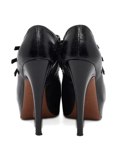 Pre-owned Alaïa Straps Buckle Pumps In Black