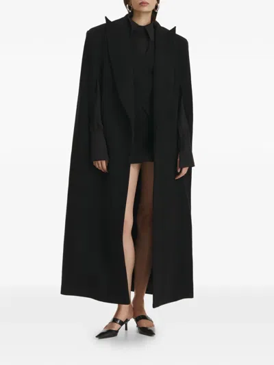 Vestiaire D'un Oiseau Libre Collared Slit Cape In Black