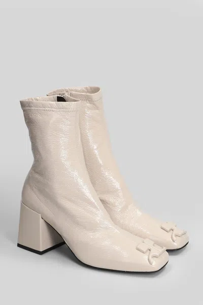 Courrèges High Heels Ankle Boots In Beige Leather In Neutral