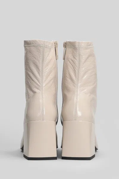 Courrèges High Heels Ankle Boots In Beige Leather In Neutral