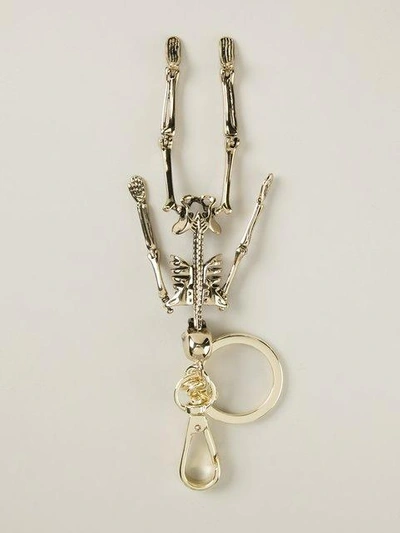 Shop Alexander Mcqueen Skeleton Keyring In Metallic