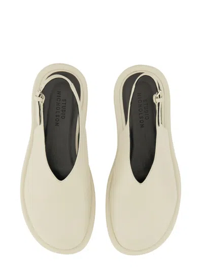 Studio Nicholson Minimalist Slingback Flats In White
