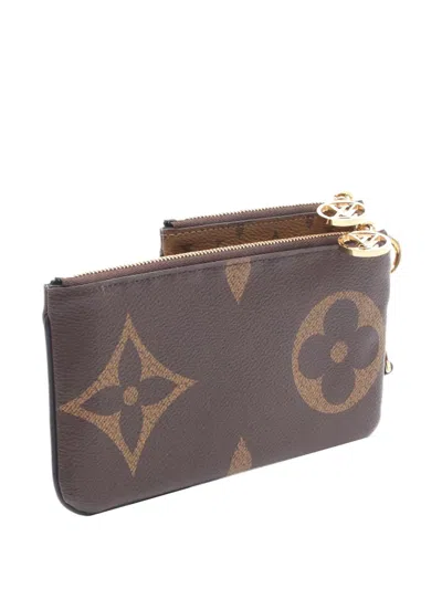 Pre-owned Louis Vuitton 2020 Monogram Giant Reverse Pochette Trio Pouch In Brown