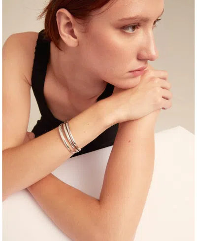 Unode50 Rigid Engraved Logo Triple Row Cuff Bracelet In Silver