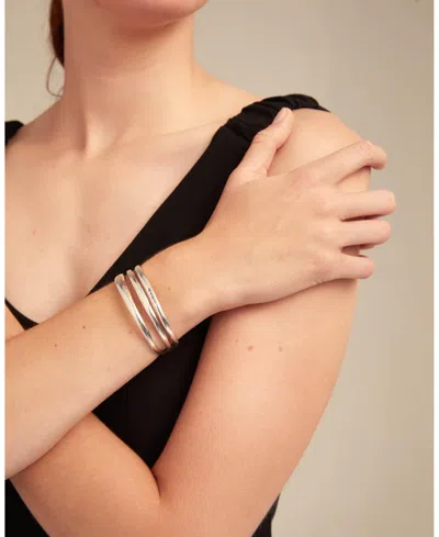 Unode50 Rigid Engraved Logo Triple Row Cuff Bracelet In Silver