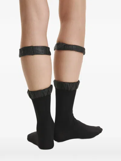 Vestiaire D'un Oiseau Libre Suspender-ring Socks In Black