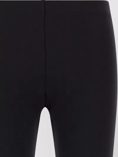 The Row Woolworth Seamless Slim Fit Tailored Trousers In Black