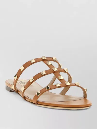 Valentino Garavani Flat Sole Rockstud Leather Sandals In A76 Candy Rose