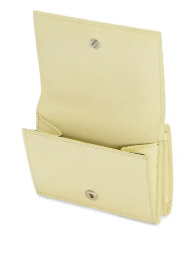 Jil Sander Embossed Folded Mini Wallet In Yellow