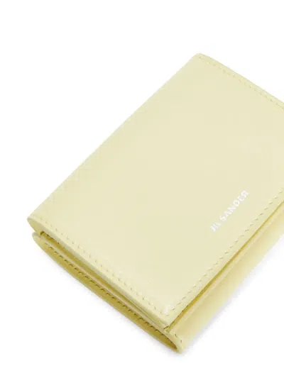 Jil Sander Embossed Folded Mini Wallet In Yellow