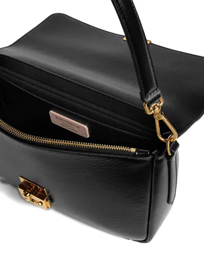 Coccinelle Large C-me Lock Shoulder Bag In Black