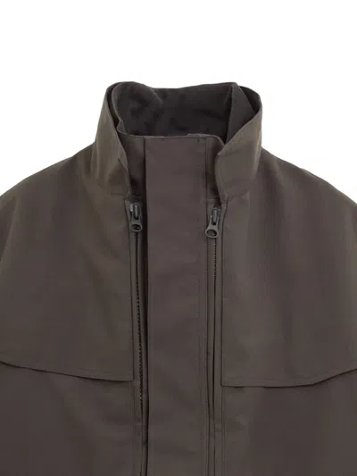 Gr10k Zipped Flap-pocket Jacket In Brown