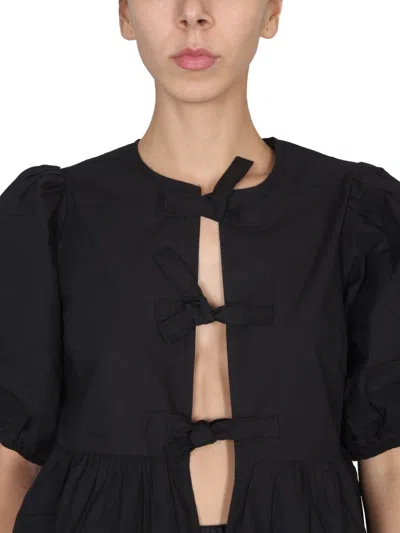 Ganni Poplin Front-tie Peplum Blouse With Puffed-sleeves In Black