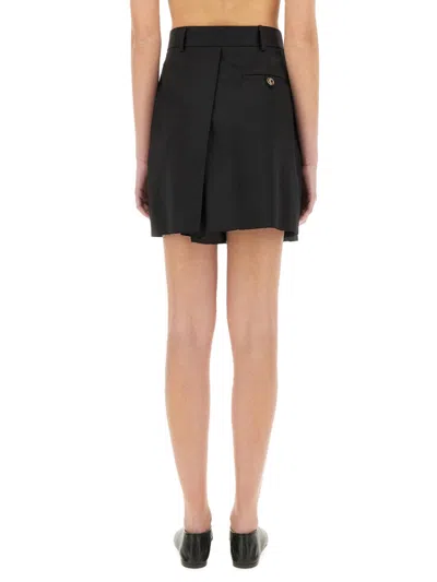 Moschino Couture Asymmetrical Wool Shorts In Black