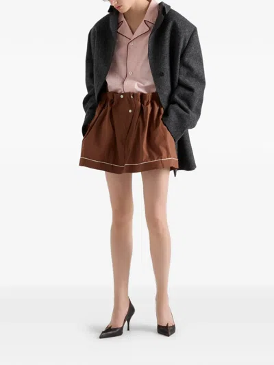 Prada Elasticated Button Mini Skirt In Brown