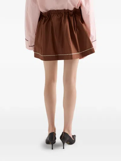 Prada Elasticated Button Mini Skirt In Brown
