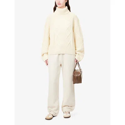 The Couture Club Womens  Embossed-emblem Roll-neck Knitted Jumper In White