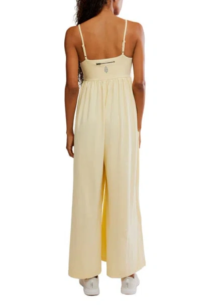 Free People Fp Movement Hot Shot Strappy Stretch Cotton Jumpsuit In Yellow