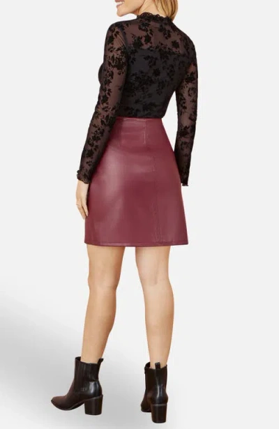 Yumi Faux Leather Wrap Mini Skirt In Burgundy