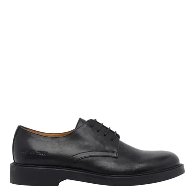 Common Projects Officer Style Lace Up Brogues In Black