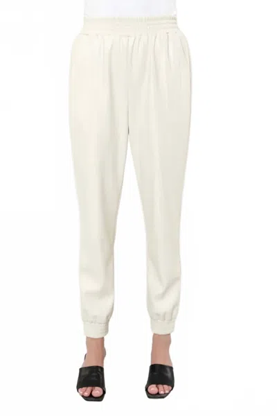 Dolce Cabo Faux Leather Jogger In Beige In White