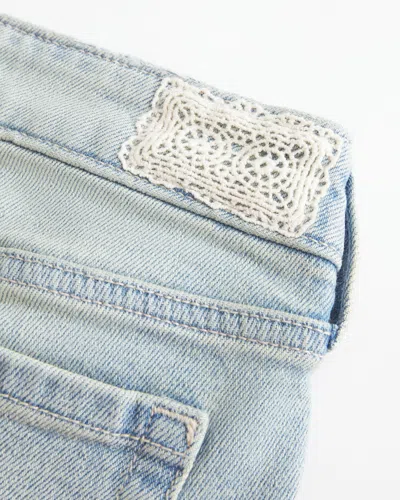 Hollister Ultra Low-rise Light Wash Let-down Hem Flare Jeans In Blue