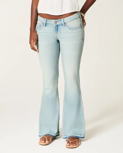 Hollister Ultra Low-rise Light Wash Let-down Hem Flare Jeans In Blue