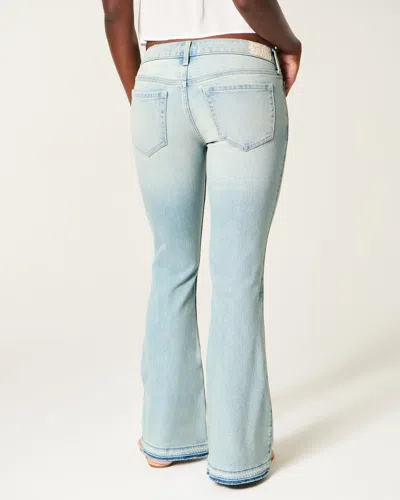 Hollister Ultra Low-rise Light Wash Let-down Hem Flare Jeans In Blue