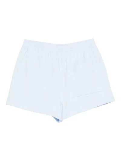 Sporty And Rich X Hotel Du Cap Eden Roc Eden Crest Embroidered Mini Shorts In Blue