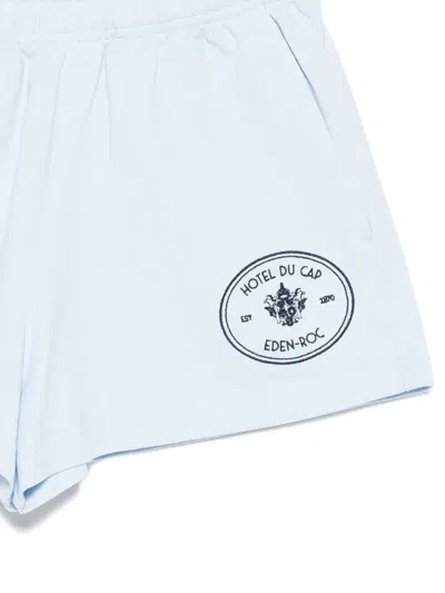 Sporty And Rich X Hotel Du Cap Eden Roc Eden Crest Embroidered Mini Shorts In Blue