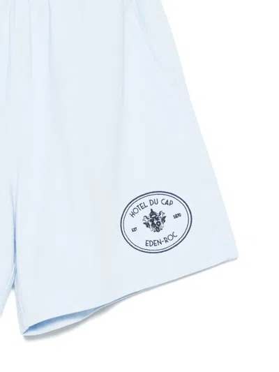 Sporty And Rich X Hotel Du Cap Eden Roc Eden Crest Embroidered Mini Shorts In Blue