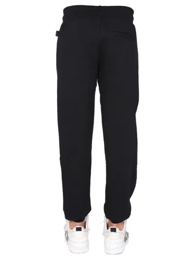 Gcds Stylish Jogging Pants With Signature Logo Band In Black