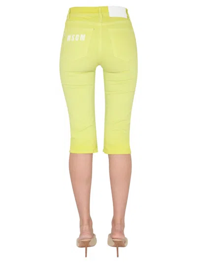 Msgm Mid-length Slim Fit Jeans In Yellow