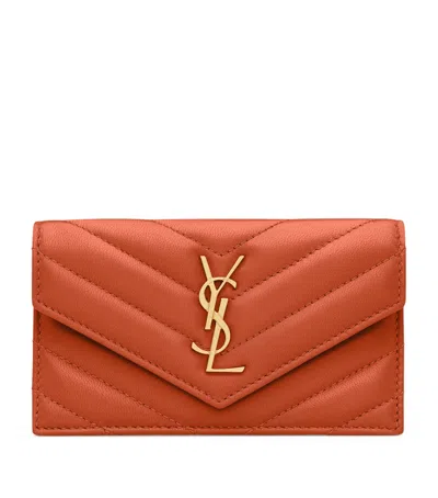 Saint Laurent Leather Cassandre Fragments Flap Card Holder In Brown