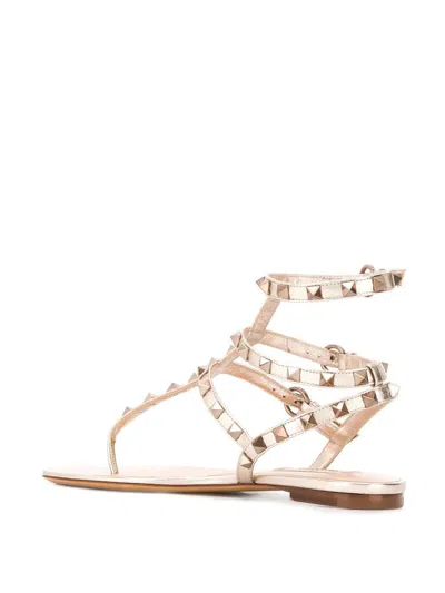 Valentino Rockstud Leather Cage Flat Thong Sandals In Gold