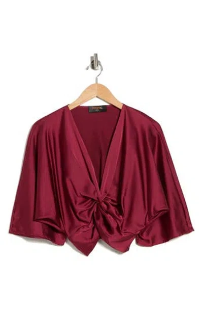 Renee C Plunge Neck Long Sleeve Twisted Knot Satin Top In Burgundy